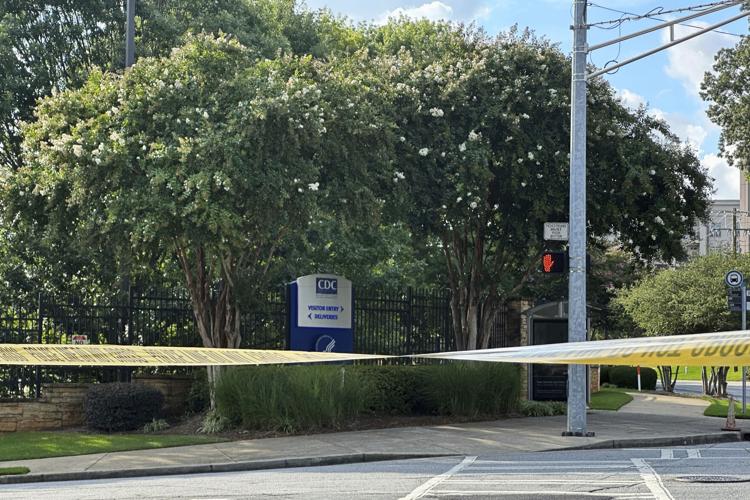 Suspected gunman and police officer dead in shooting near the CDC and