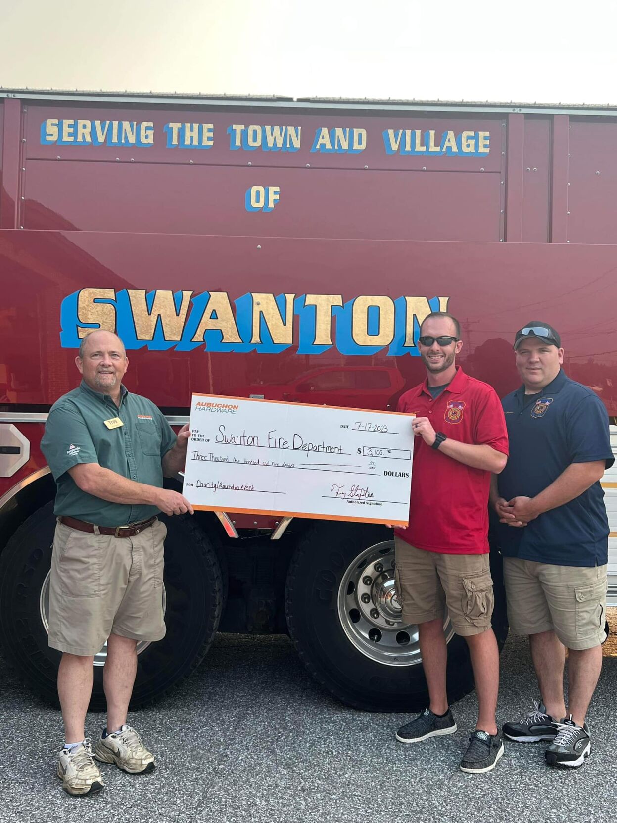 Swanton Village Fire Department receives check from Aubuchon Hardware