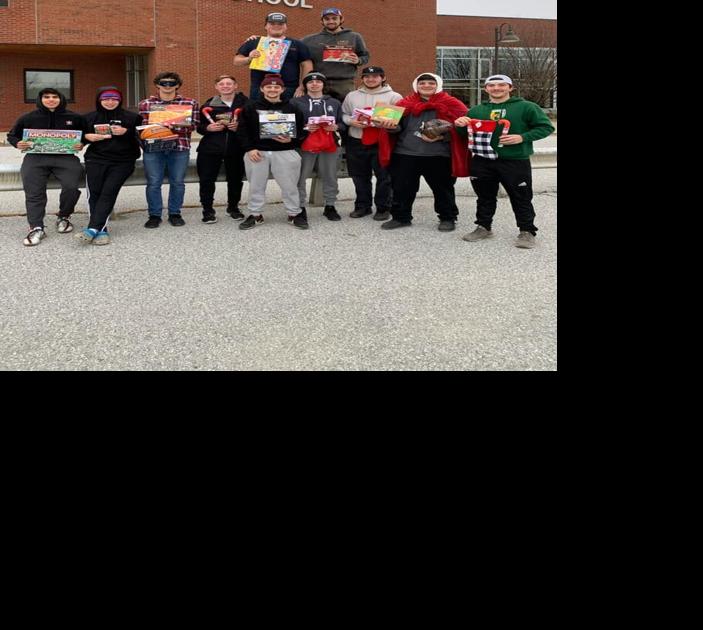 Enosburg boys varsity basketball spreads holiday cheer with third