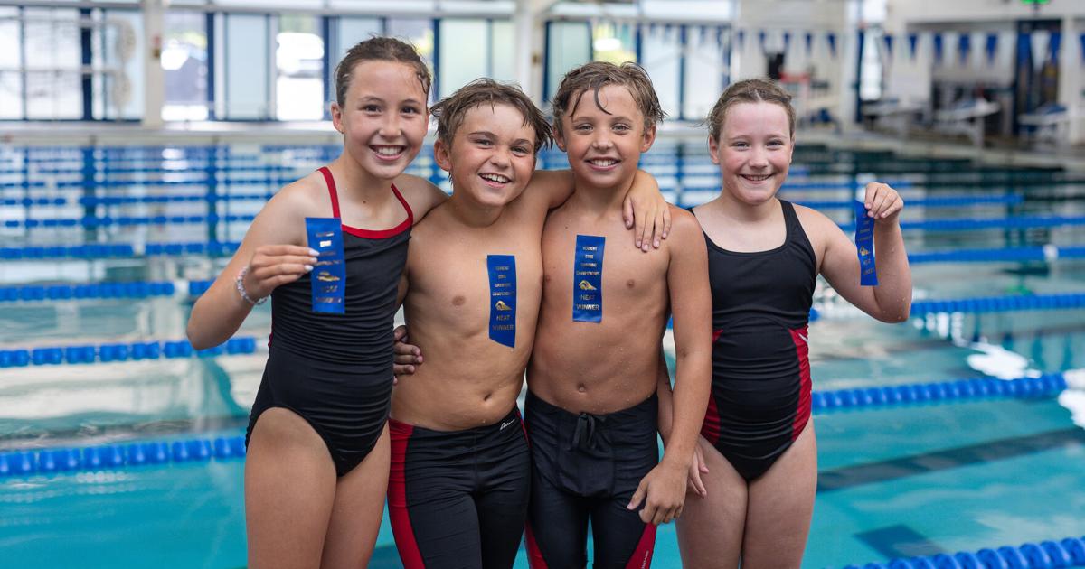 Sharks swim team finishes third at states!