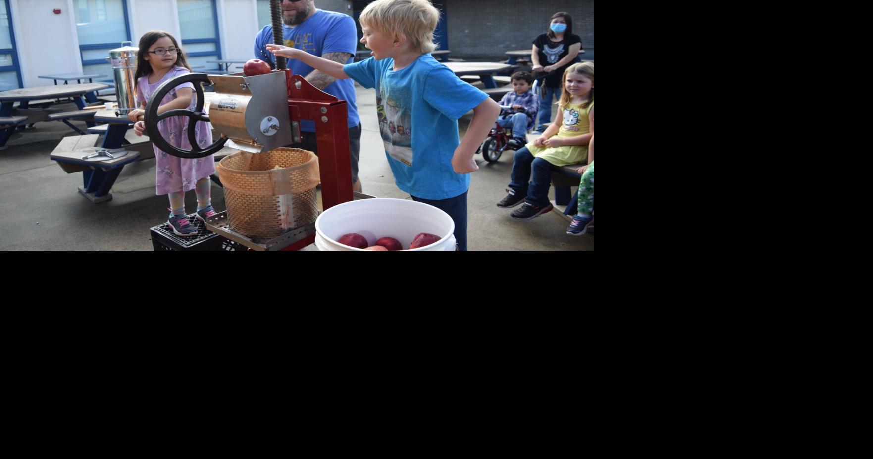 PHOTOS St. Albans City School students learn to make apple cider