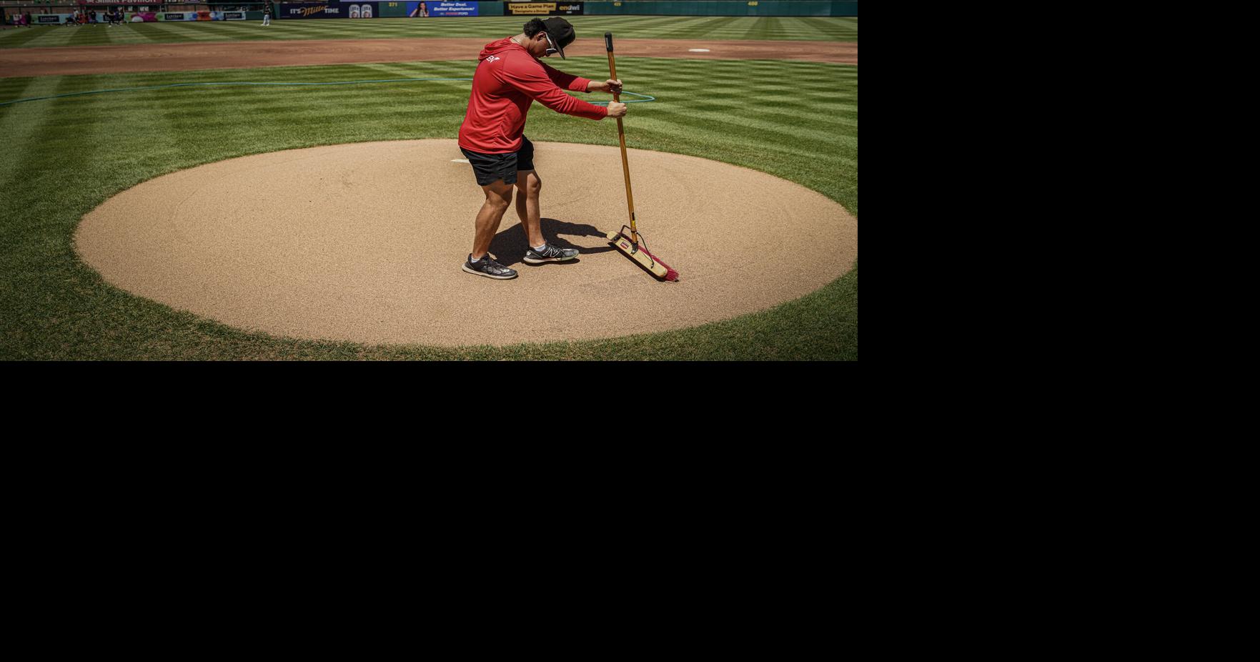 Isotopes' grounds crew spends long hours keeping playing field pristine