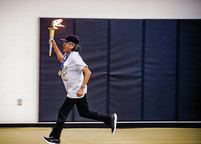 Carrying torch for New Mexico Senior Olympics Local News