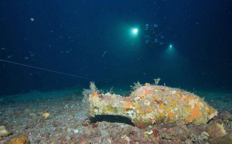 Divers explore ancient shipwreck - The Columbian