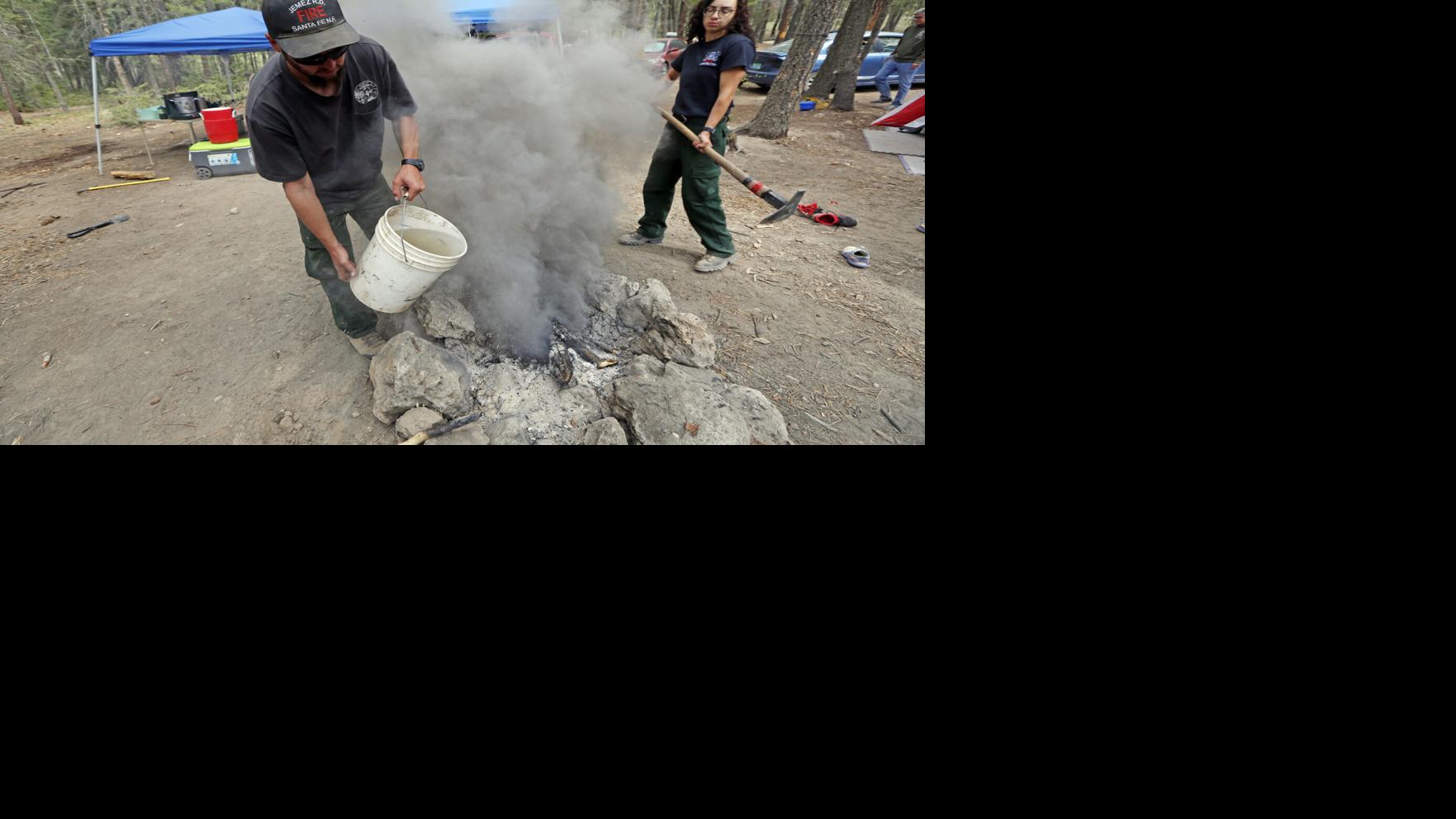 With Blaze Already Burning Santa Fe Forest Workers Sweep For Illegal Fires Local News Santafenewmexican Com