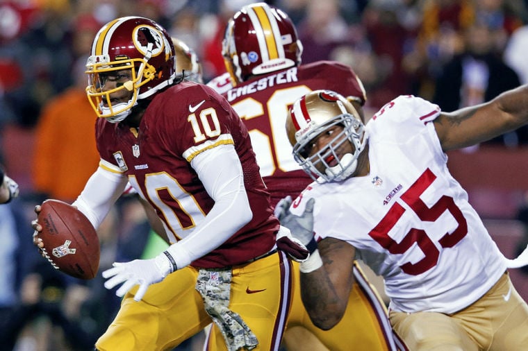 Kaepernick, 49ers dominate Redskins, RG3