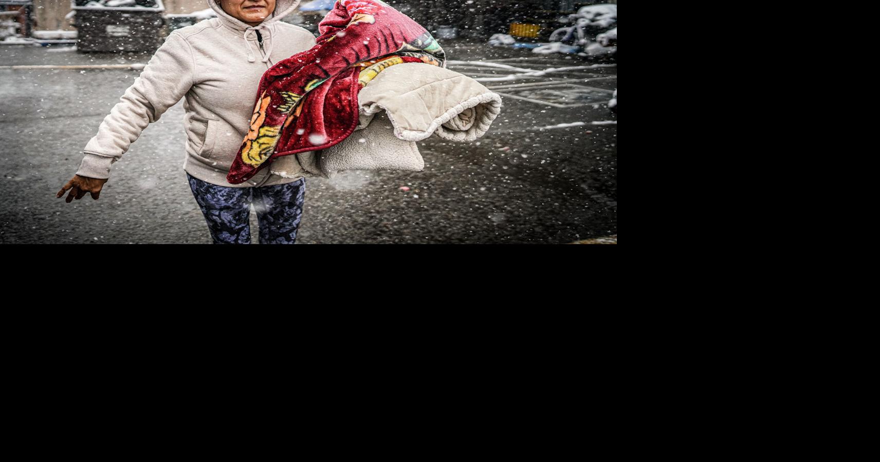 Homeless shelter prepares for storm that could dump 8-14 inches of snow ...