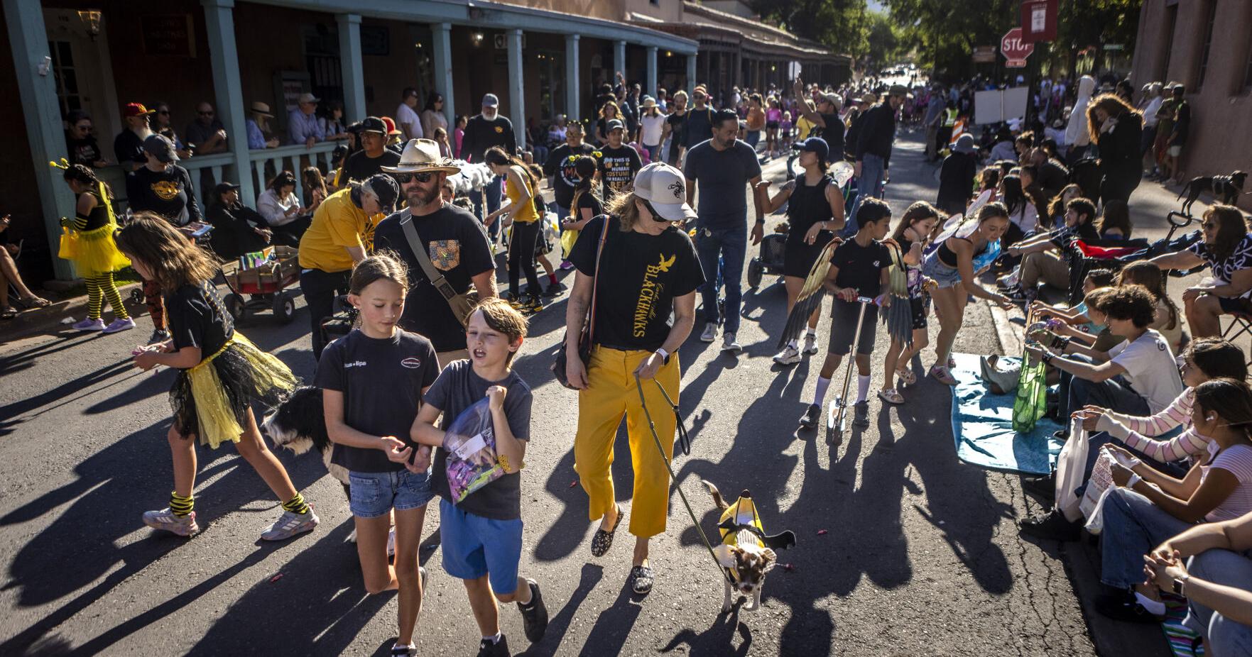 After 100 years , pet parade still a Fiesta favorite for kids and adults alike