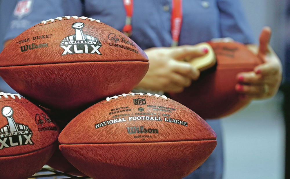 Capital High coach's experiment shows footballs lose air pressure, Sports