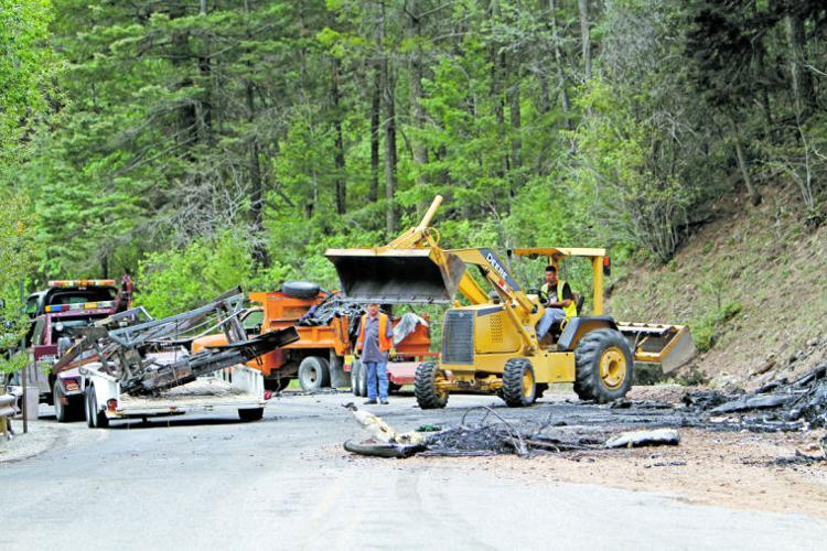 Vehicle rollover and fire closes down Hyde Park Road Local News