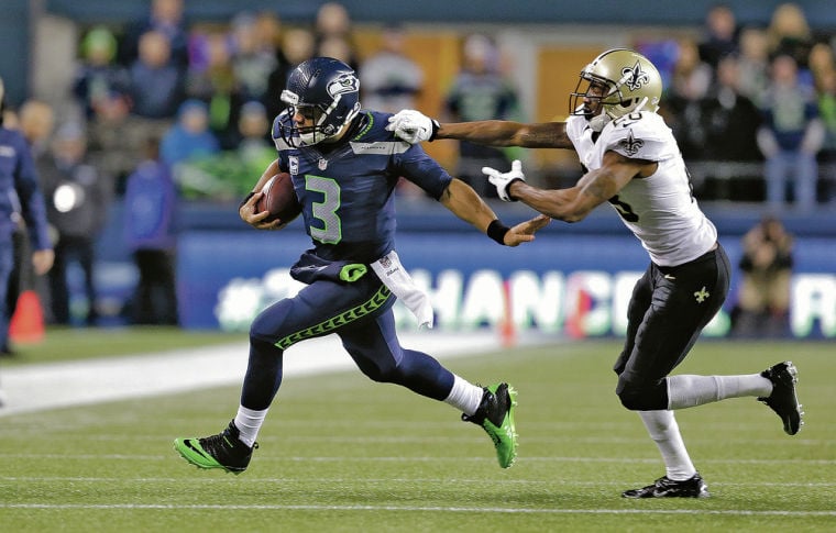 Seahawks, Wilson overpower Saints 34-7, clinch playoff spot