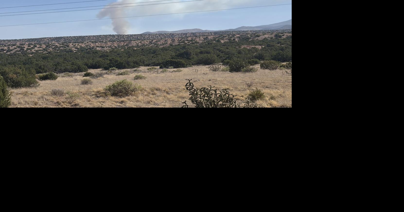 Fire burning in national forest north of Santa Fe