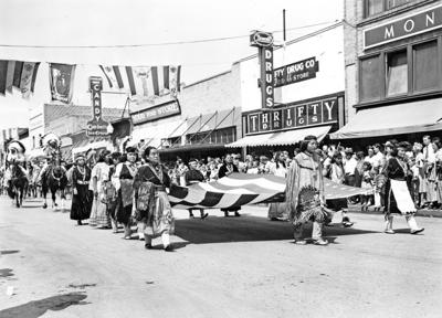 gallup ceremonial dust trail impression visitor teen left santafenewmexican mexico history governors 1948 flags parade carry palace native courtesy archives