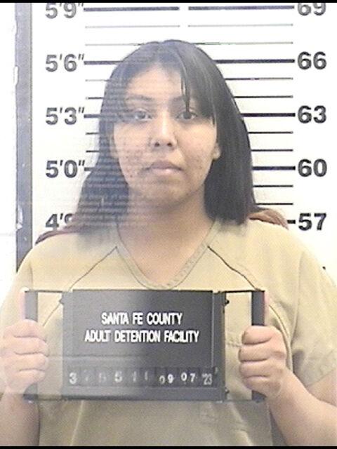 Santa Fe couple accused ofextortion of Farmington woman Local