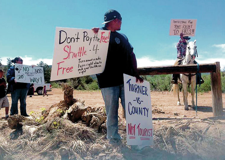 Protesters decry rancher�s fee on road leading to Grand