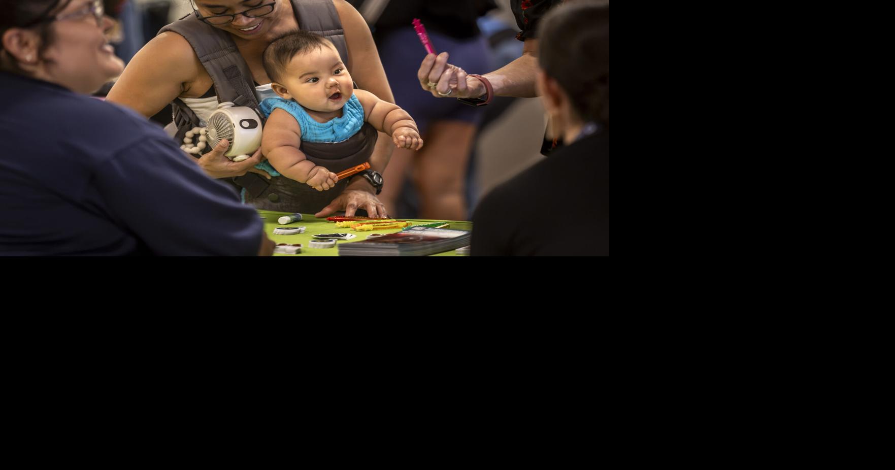Despite rain, attendance strong at yearly south-side business fair