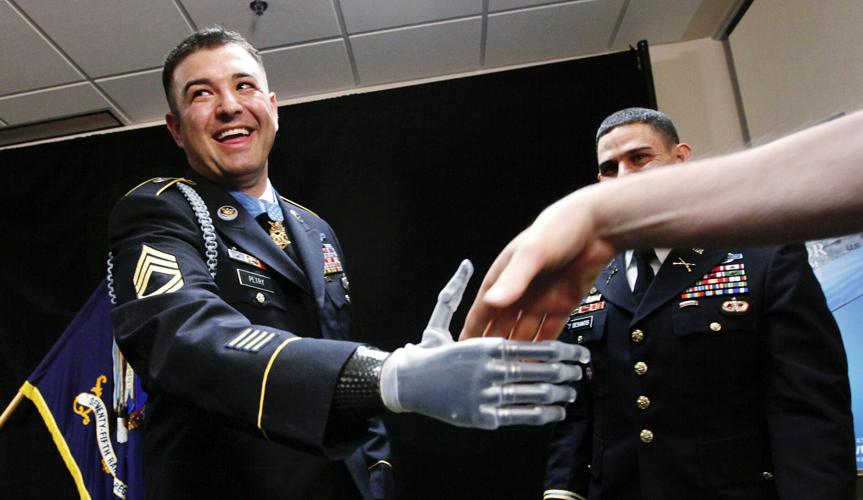 President Obama shakes the prosthetic hand of U.S. Army Sgt. First Class  Leroy Arthur Petry - Medal of Honor Winner : r/pics