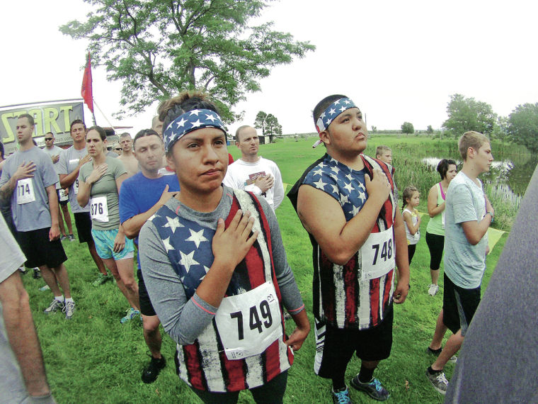 Gladiator Dash draws hundreds to Downs for extreme challenge | Local ...
