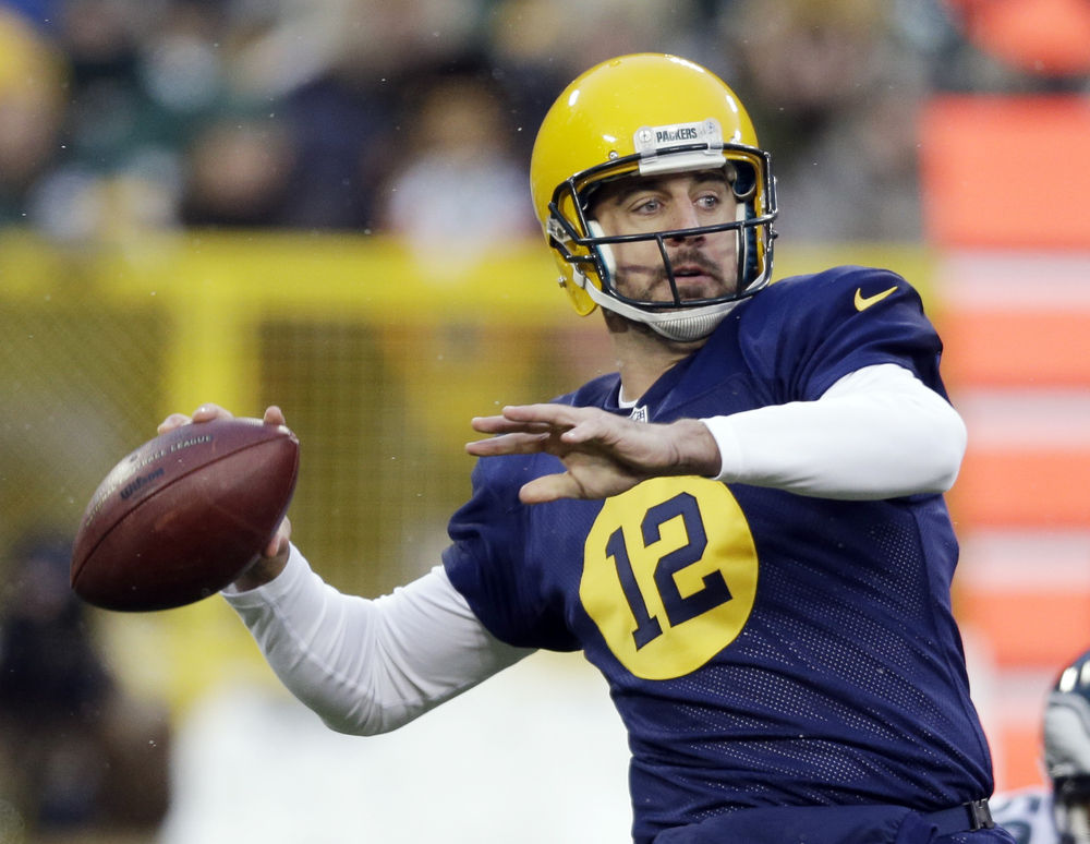 Aaron Rodgers, Julius Peppers lead Packers past Eagles 53-20