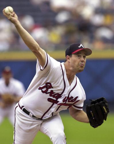 Boston Red Sox winning starting pitcher Mike Maddux delivers a