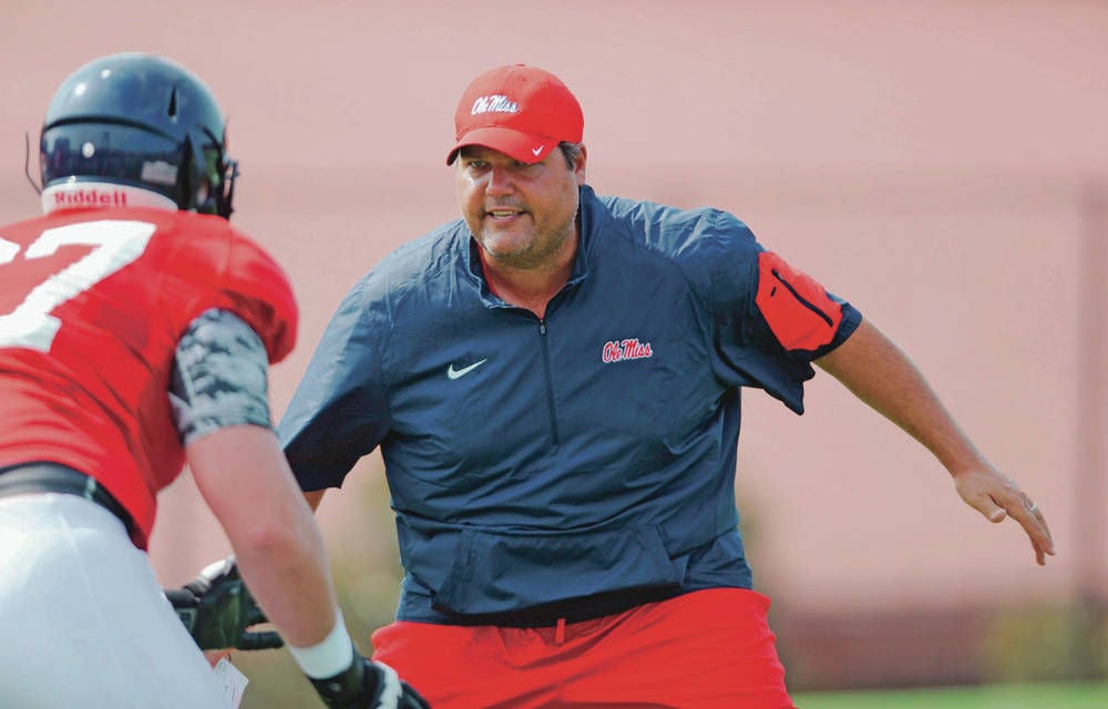 Ole Miss coach Hugh Freeze resigns; report cites link to escort service Ole Miss coach Hugh Freeze resigns; report cites link to escort service