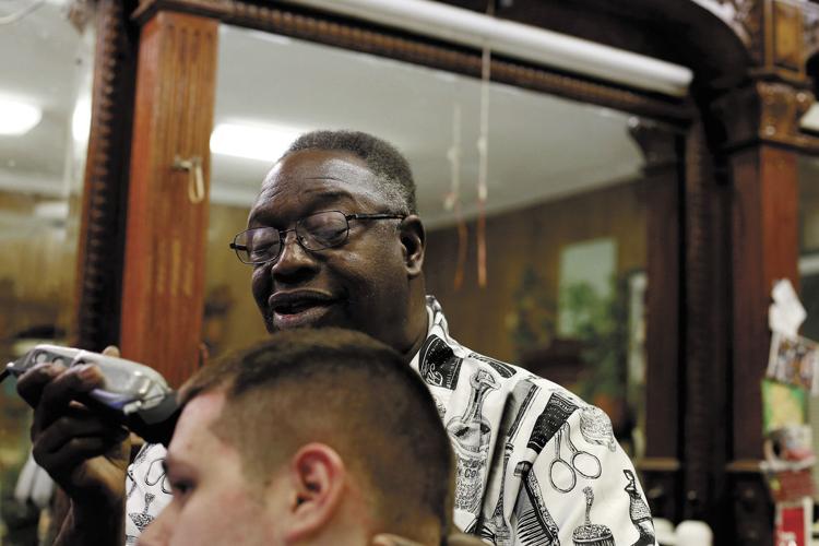 Marion barber shop still family-owned after 100 years