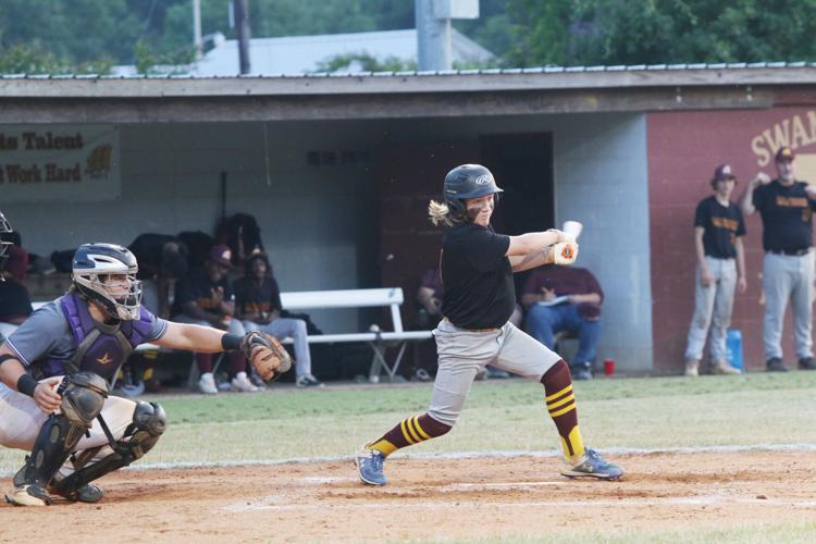 Phillip Simmons holds-off Marion 12-8