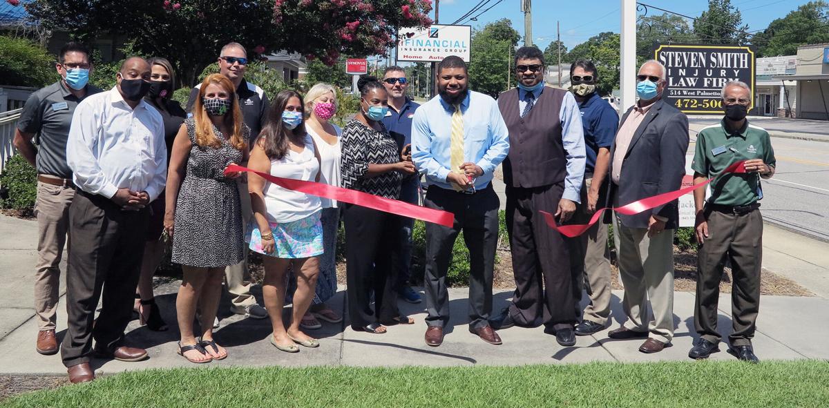 Steven Smith Injury Law Firm holds ribbon cutting with chamber