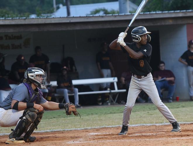 Phillip Simmons holds-off Marion 12-8