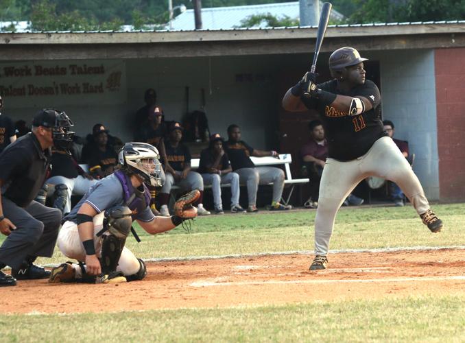 Phillip Simmons holds-off Marion 12-8
