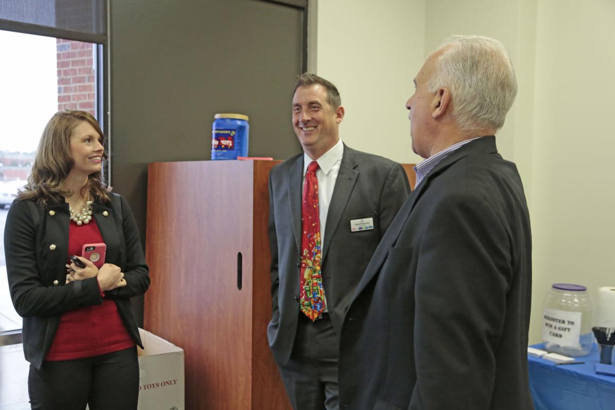 Sharonview Federal Credit Union unveils new logo at ribbon cutting ceremony