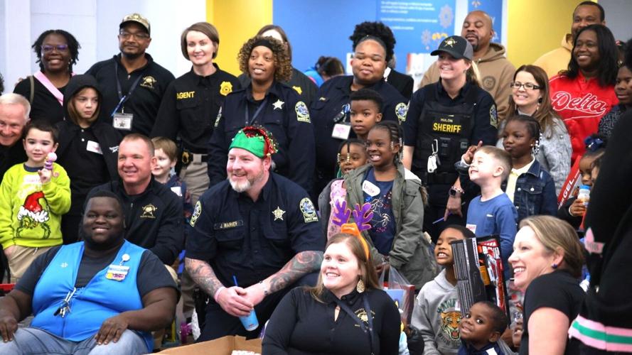 Marion County Sheriff’s Office treat 50 children to 'Shop with a Cop' experience