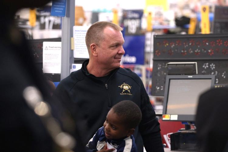 Marion County Sheriff’s Office treat 50 children to 'Shop with a Cop' experience