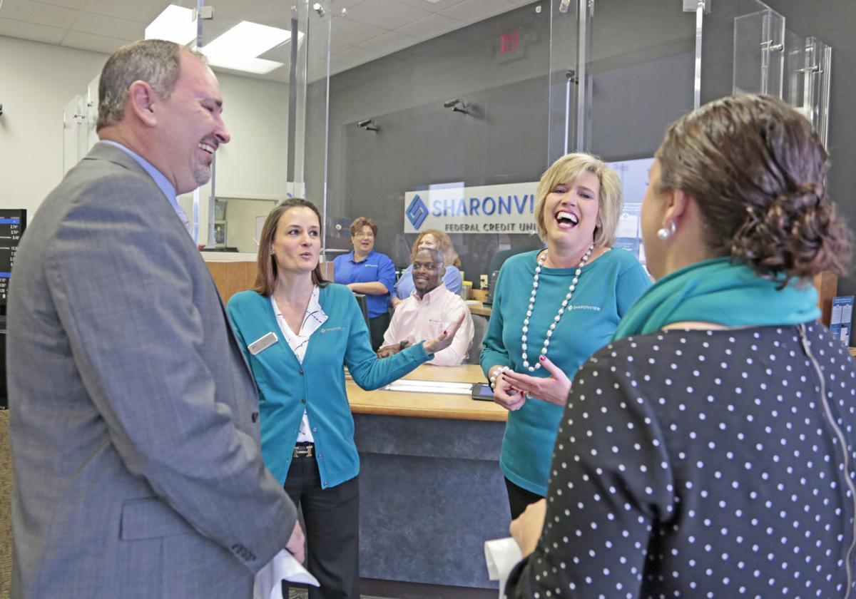 Sharonview Federal Credit Union unveils new logo at ribbon cutting ceremony