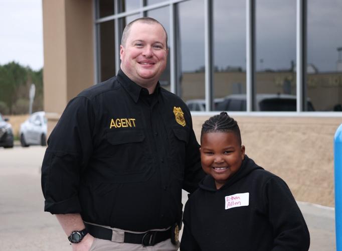 Marion County Sheriff’s Office treat 50 children to 'Shop with a Cop' experience