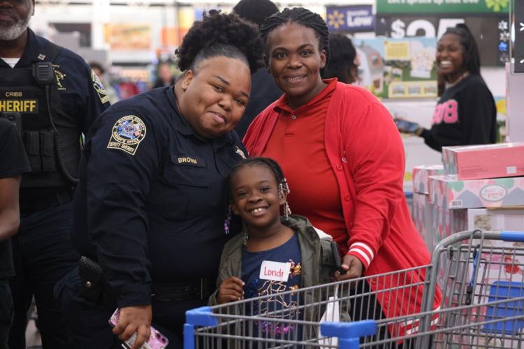 Marion County Sheriff’s Office treat 50 children to 'Shop with a Cop' experience