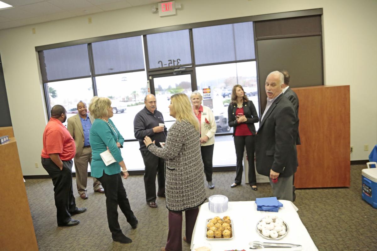 Sharonview Federal Credit Union unveils new logo at ribbon cutting ceremony
