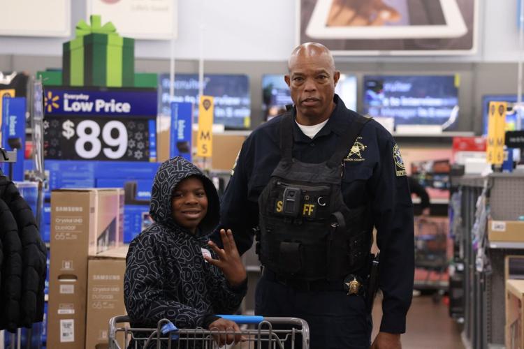 Marion County Sheriff’s Office treat 50 children to 'Shop with a Cop' experience