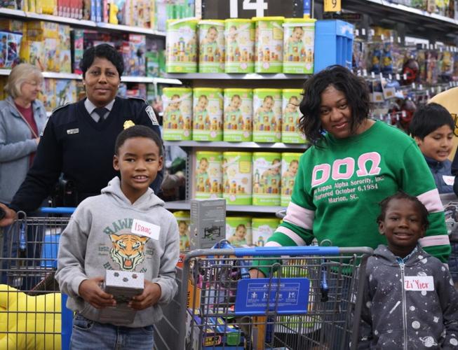 Marion County Sheriff’s Office treat 50 children to 'Shop with a Cop' experience