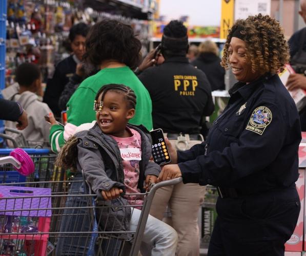 Marion County Sheriff’s Office treat 50 children to 'Shop with a Cop' experience