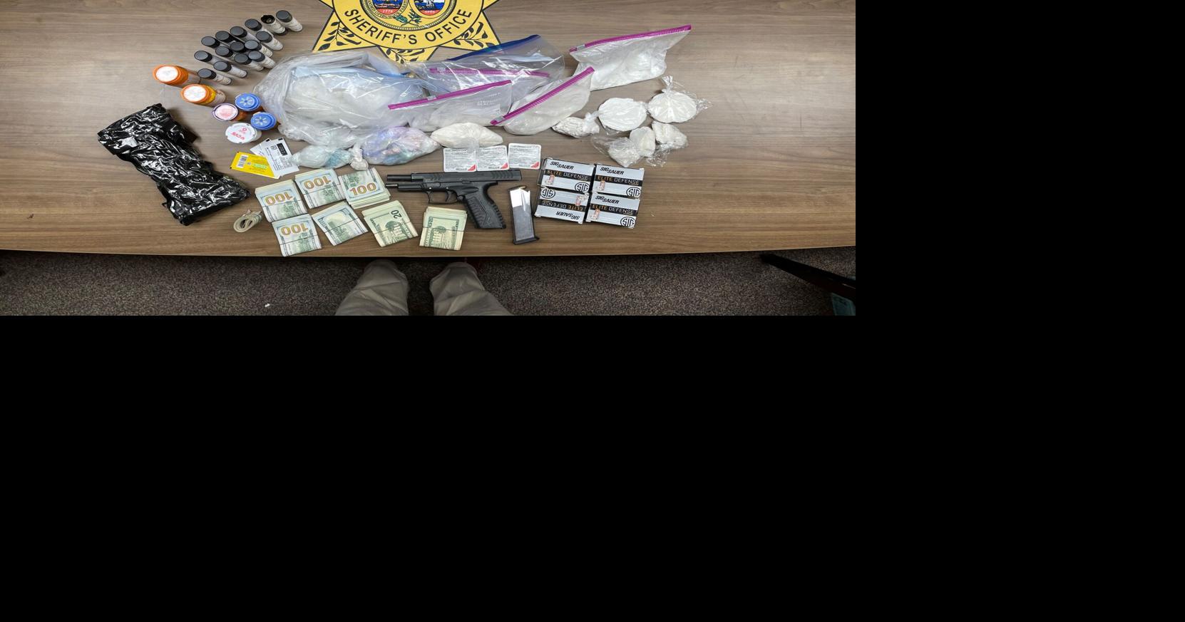 Deputies serve Florence search warrant, arrest two, seize cash, gun and ...