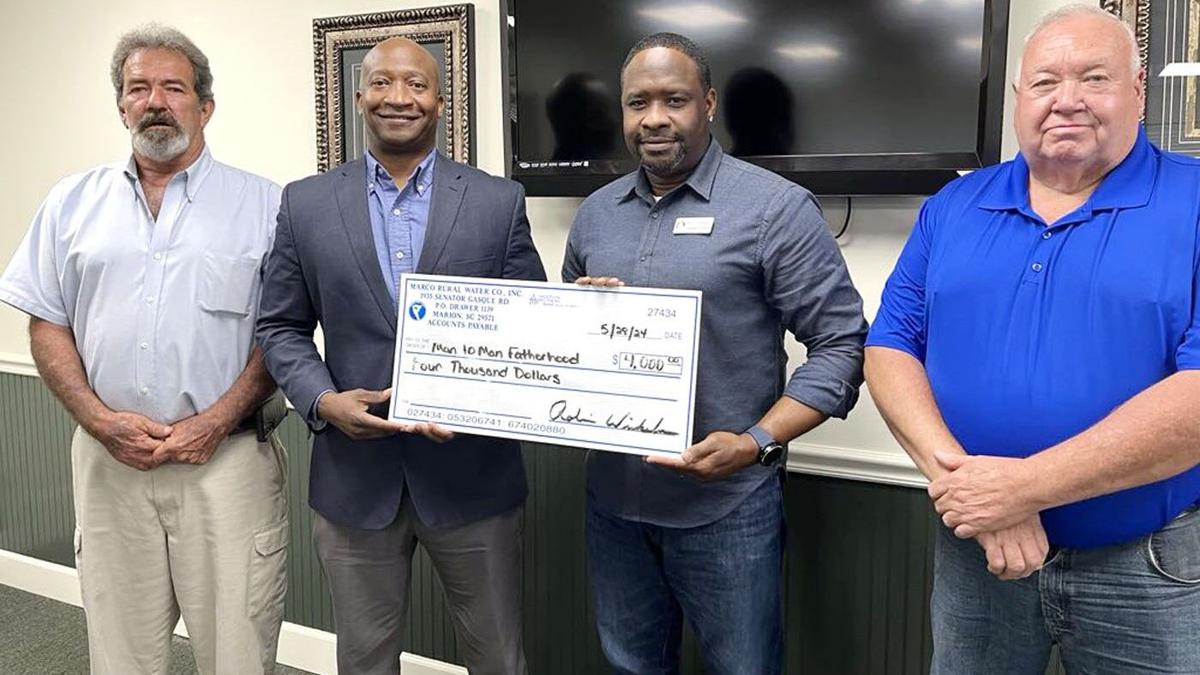 MarCo Rural Water gives 4k to Man 2 Man Fatherhood