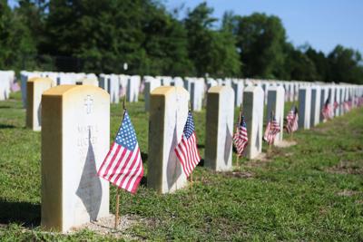 Volunteers To Put Flags On Graves In Florence National Cemetery