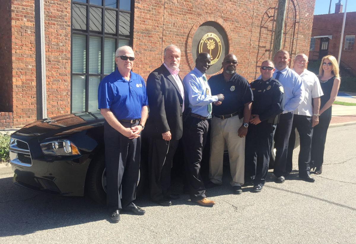 Anderson Brothers Bank donates car to Mullins Police Department