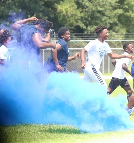 Gamecocks football players organize youth football camp in Mullins
