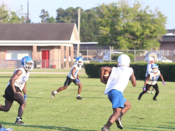 New Mullins football coach taking advantage of time with team during FCA passing league