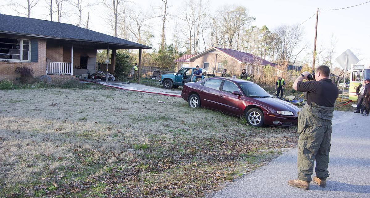 Reported south Florence hostage situation ends with house fire, one in