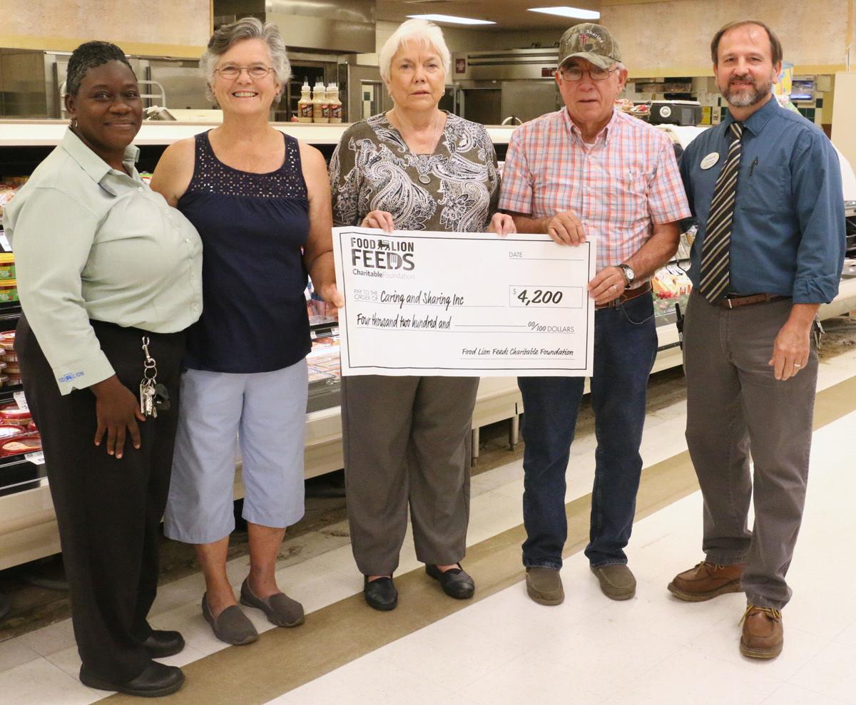 Caring & Sharing receives donation from Hemingway Food Lion