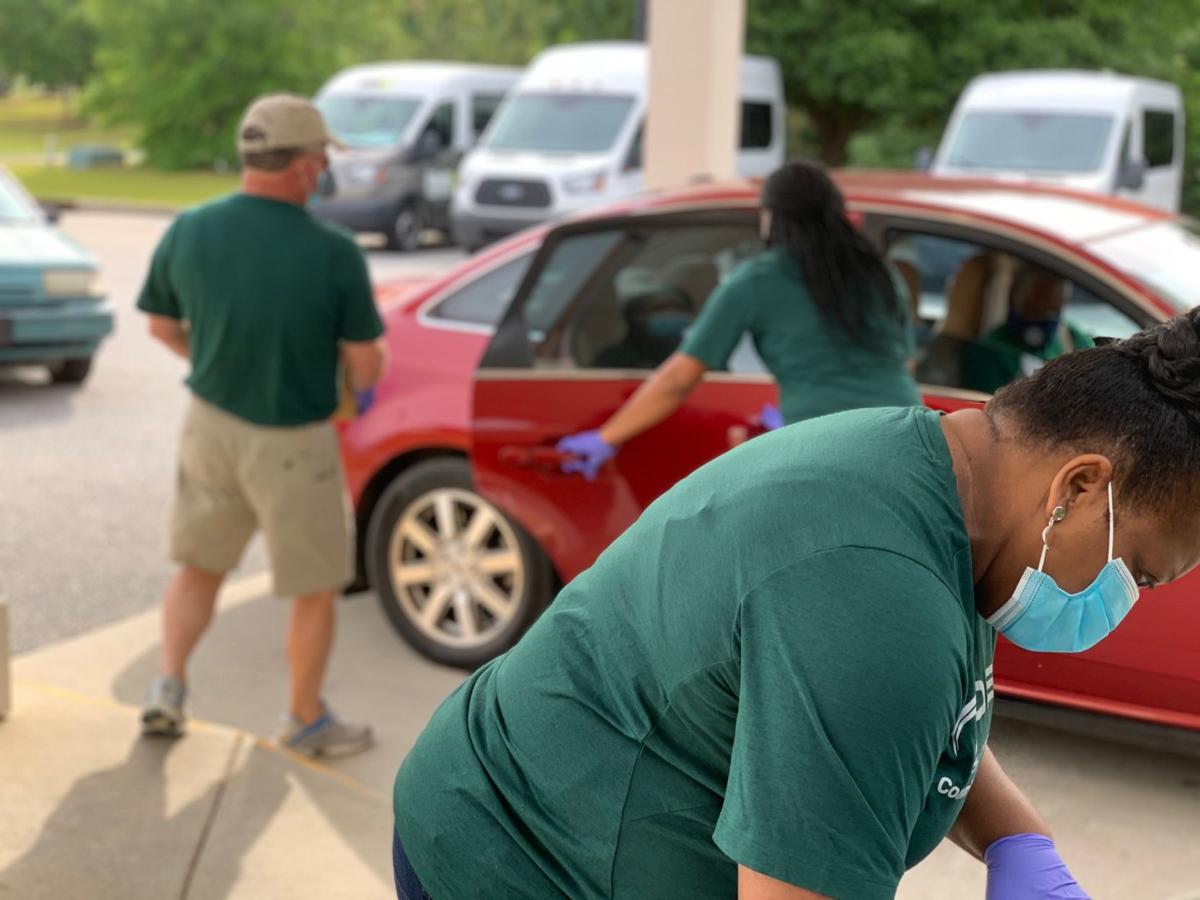 Pee Dee Electric Coop volunteers load out meals for seniors Local
