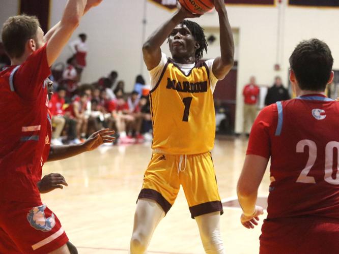 Marion cruises 63-37 over Central in playoff opener